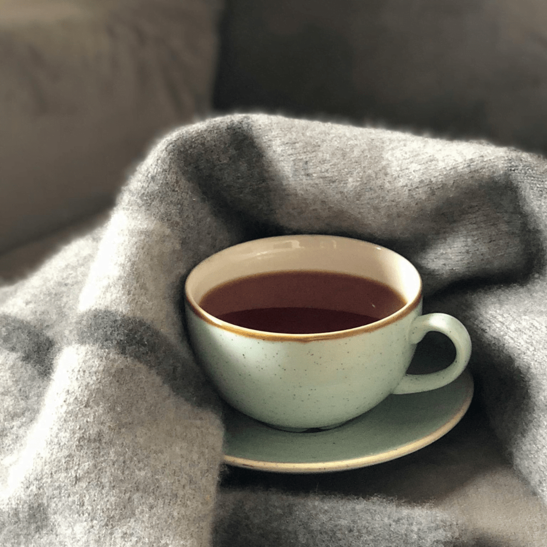 tea and blanket- Want Better Sleep 12 Relaxation Techniques