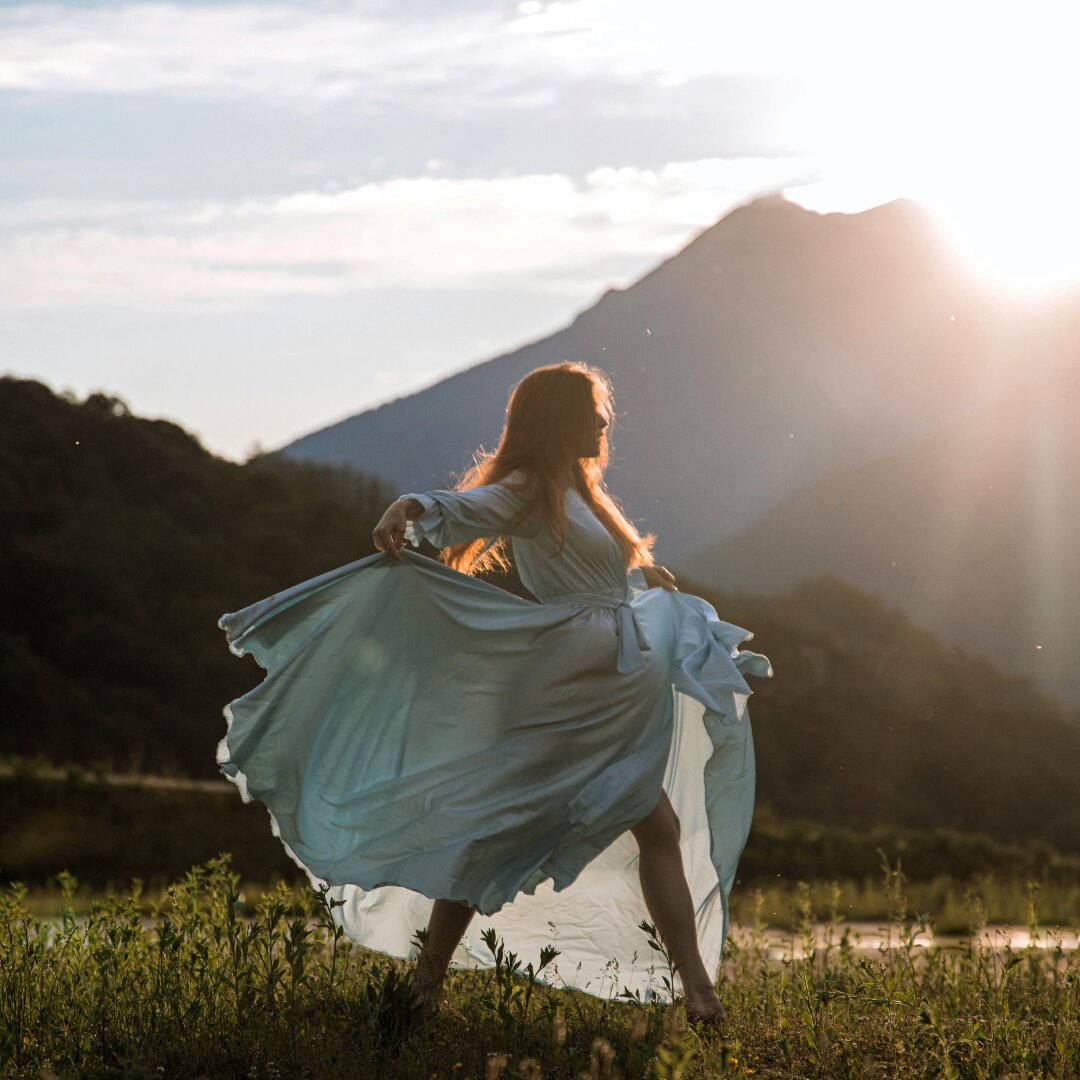 woman in dress feeling free-journaling prompts