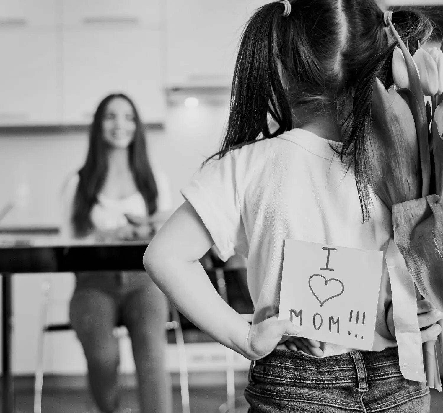 Daughter preparing surprise for mother at home -99 Memorable Mother’s Day Quotes, Sayings and Messages