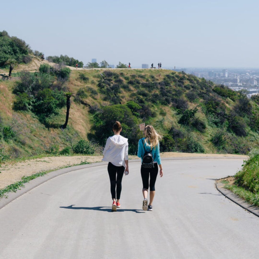 WHY IT’S SO HARD TO MAKE FRIENDS AS AN ADULT (6 Reasons) -2 girls walking on the road together