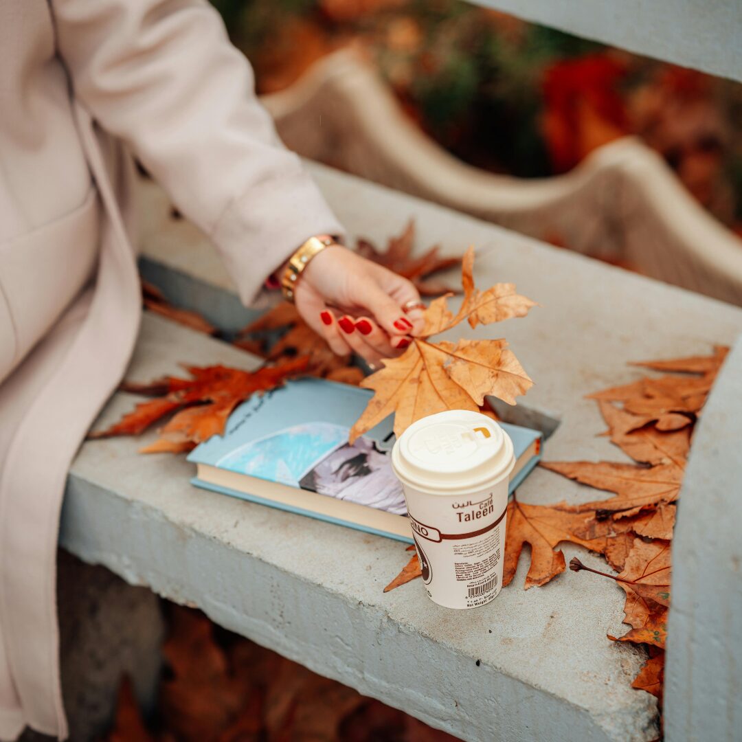 woman sitting on a park bench -18 Best Tips How to Recognize and Overcome Your Emotional Triggers From Past Relationships and Experiences