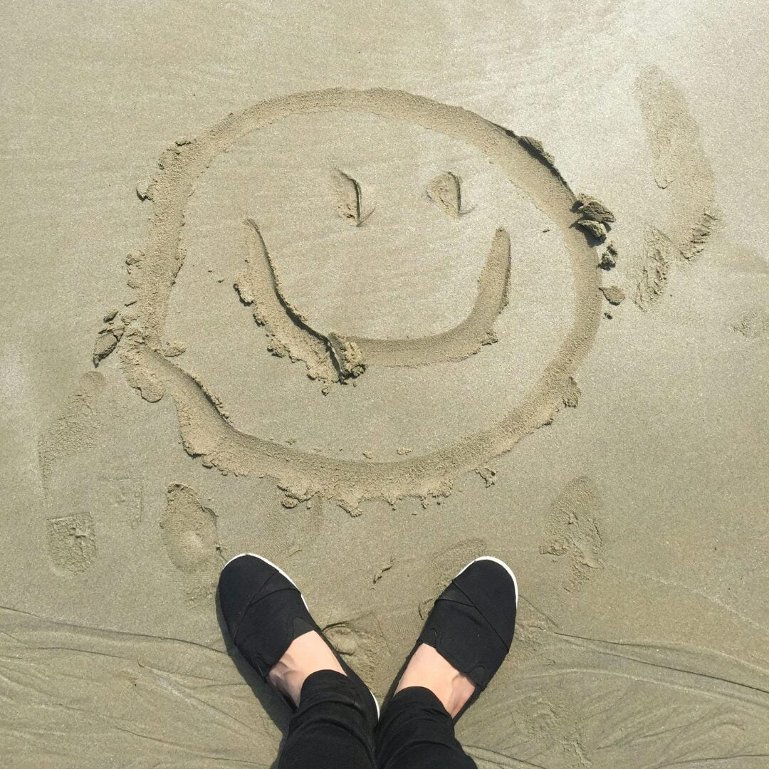 smiley face in the sand -20 Powerful Daily Affirmations For Positive Thinking