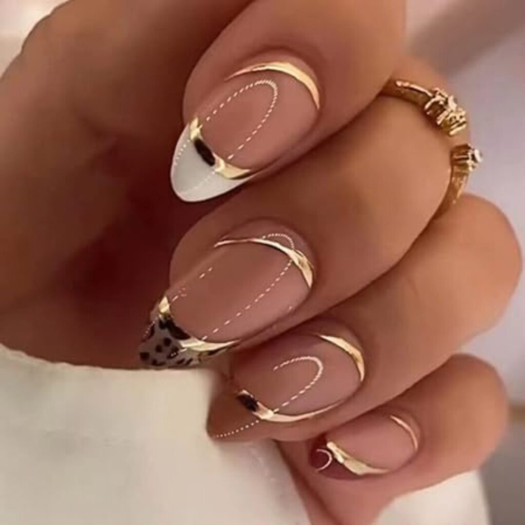 Gold Swirl Stiletto nails - 