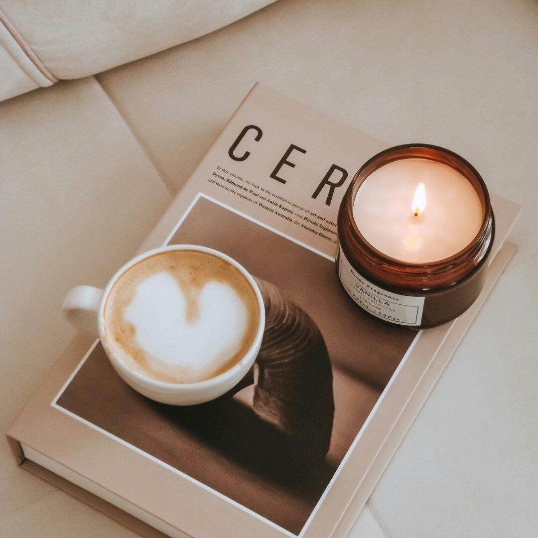 book, coffee, candle -Stress Management 14 Simple Techniques and Strategies