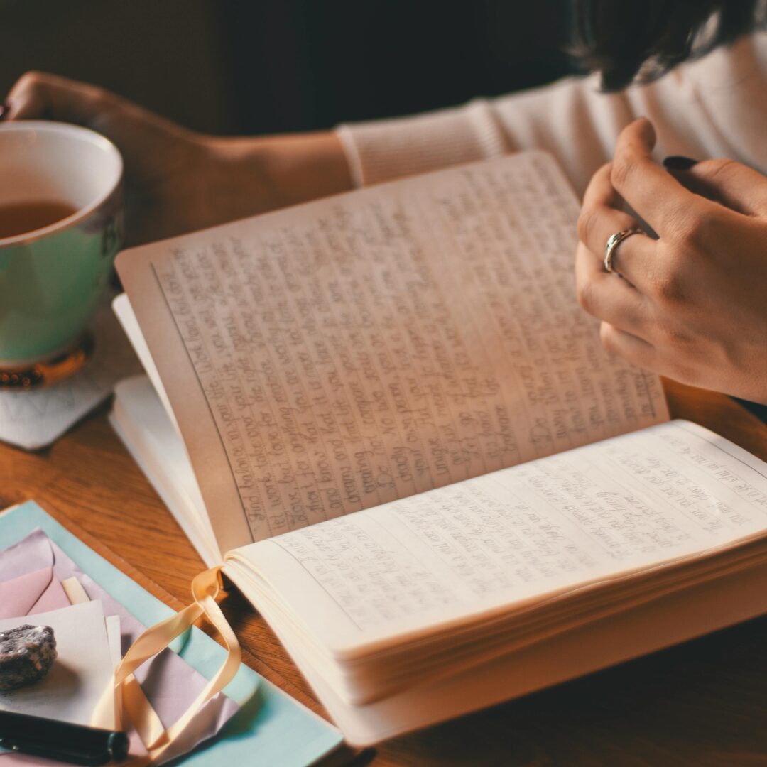 woman with a tea journaling -8 Incredible Ways How Daily Journaling Can Improve Your Mental Health in 2024