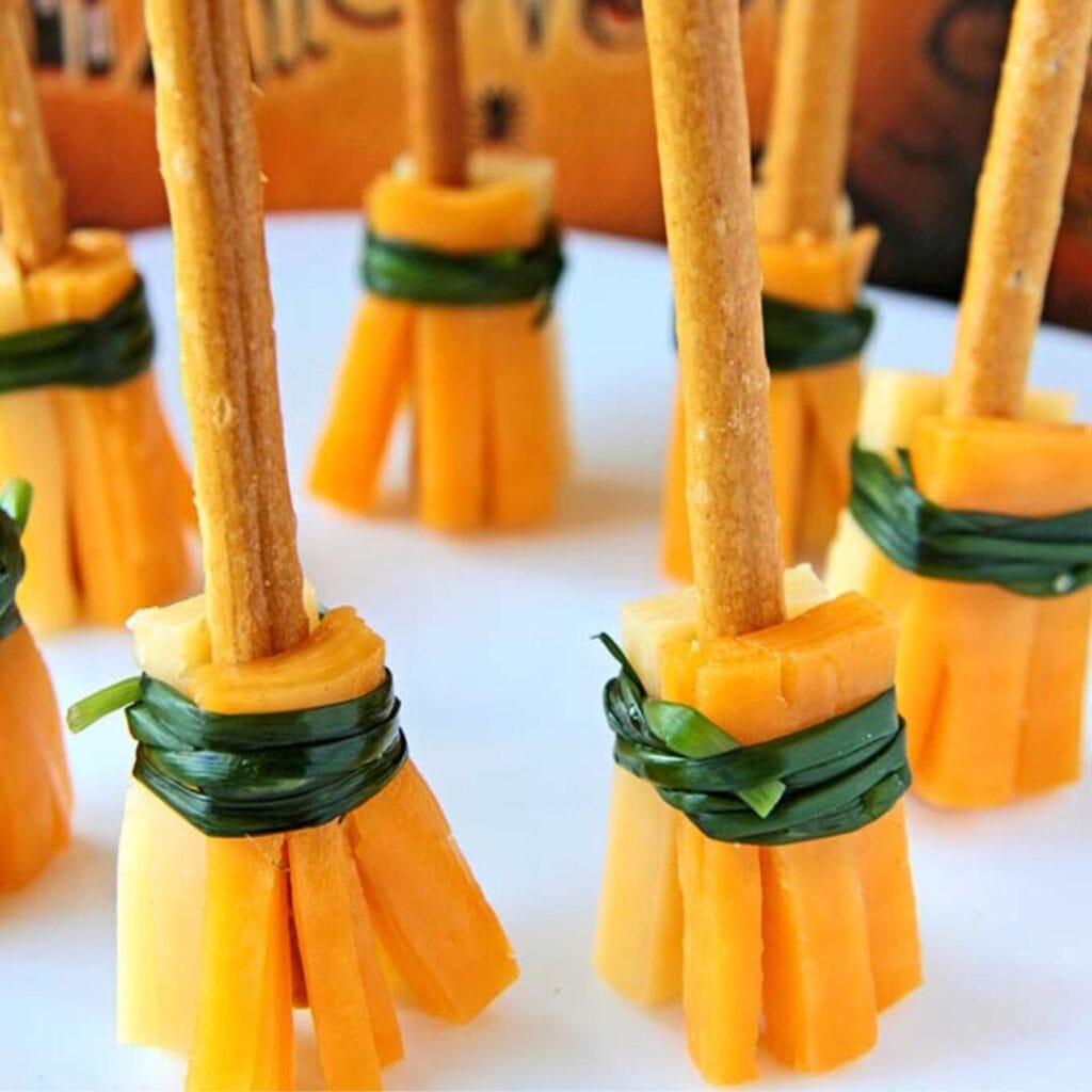 Cheesy Witches Broomsticks -30+ Spooky Halloween Treats Your Kids Will Love